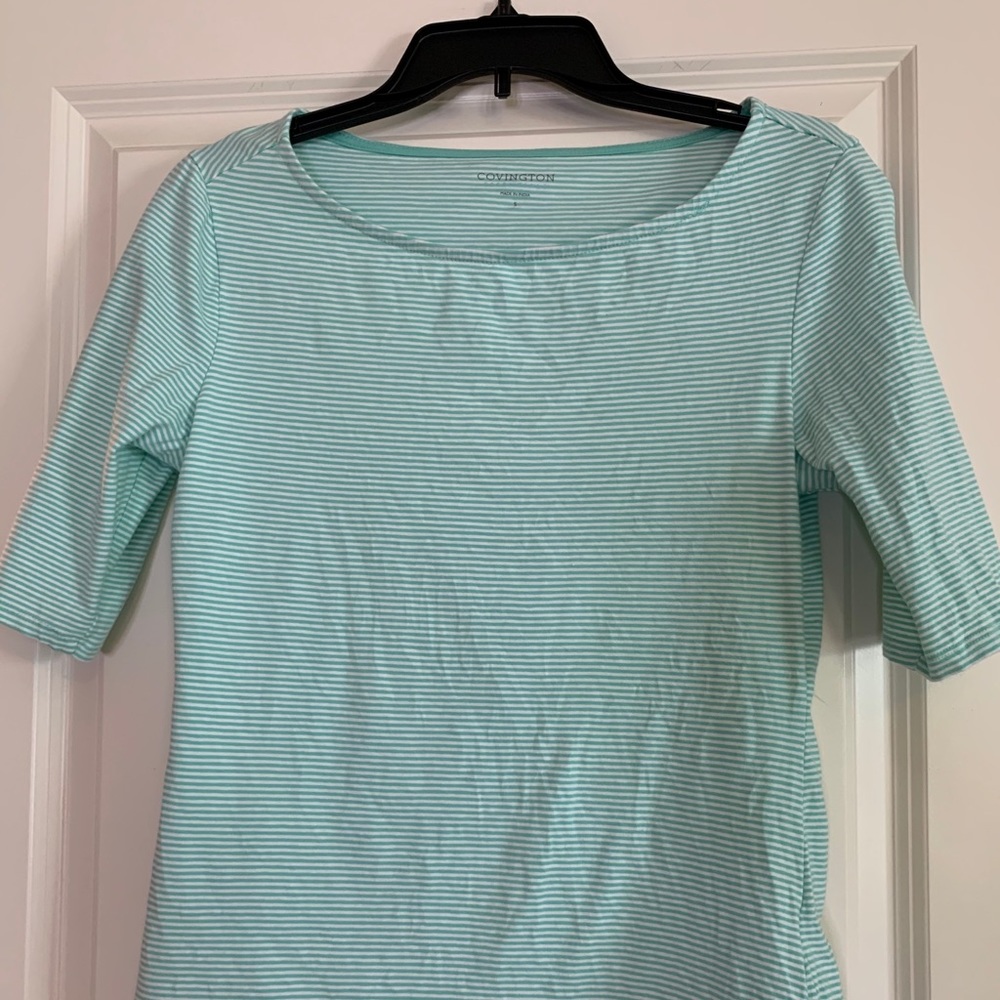 Green and white striped shirt.